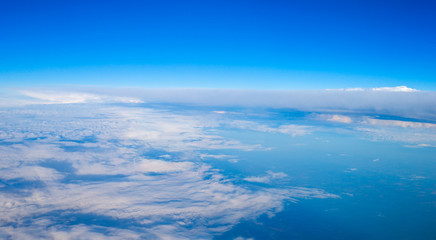 Fototapeta na wymiar Clouds, a view from airplane window