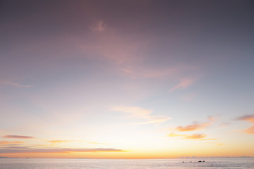 sun coming up over the sea