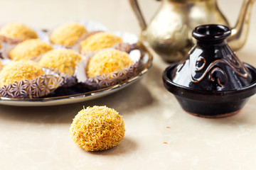 Algerian Kadaif cookies ( translated in english sweet noddles )  made with walnuts and almond, cocoa and white chocolate