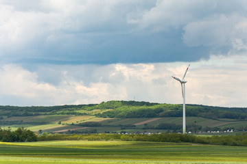 Alternative energy source. Windmill against the sky. Wind turbine in Austria.