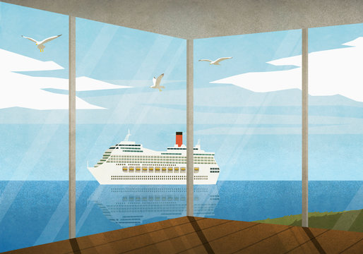 View of cruise ship moving along ocean from beach house