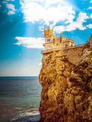 Swallow's Nest Castle in autumn day with magic sunlight