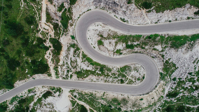 Aerial view road winding through Drei Zinnen Nature Park, South Tyrol, Italy