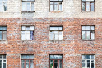 front view of shabby wall of old brick house