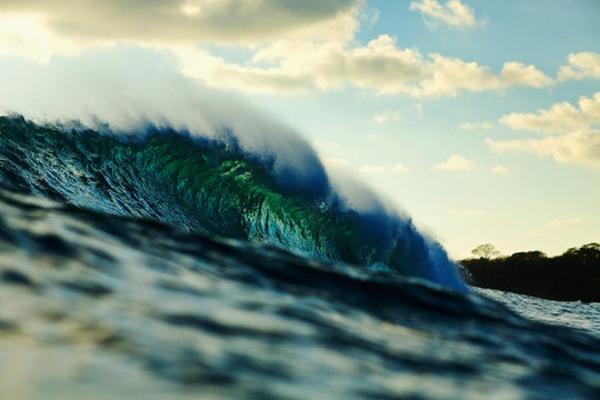 Breaking ocean wave at sunset, Punta Mita, Nayarit, Mexico