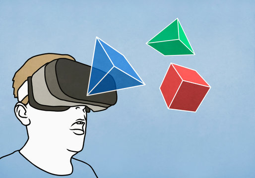 Man with virtual reality simulator glasses looking at 3D geometric shapes