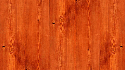 Fototapeta premium Vintage background orange wooden planks board texture.