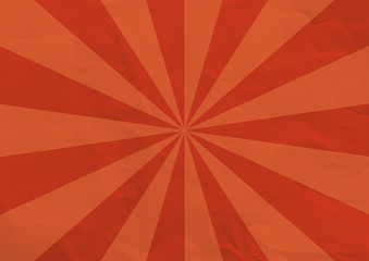 Red folded sunrays paper background.