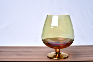 Colorful drinks glass cup on table on white background