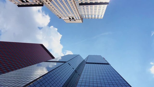 A timelapse view looking up at summer clouds in downtown Pittsburgh, Pennsylvania.  	