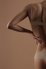 Thin young woman in underwear