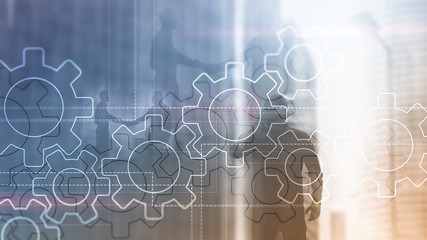 Double exposure gears mechanism on blurred background. Business and industrial process automation...