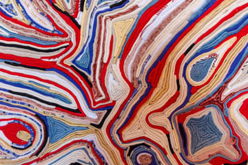 Close-up of multi-colored layers of fabric forming beautiful patterns