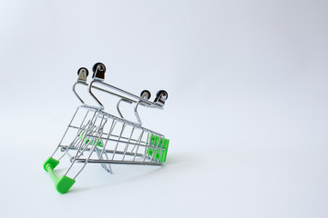 empty shopping supermarket food buy cart upside down on white background