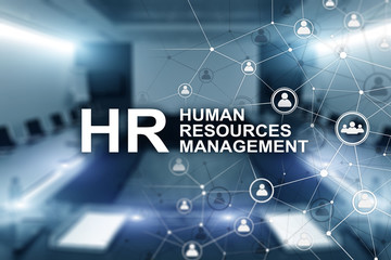 New Business Concept: Human Resources Managemen. Inscription on the background on blurry office.