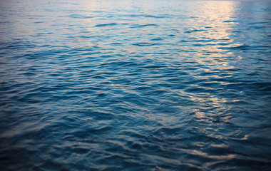Blue abstract background. Calm sea water surface background.