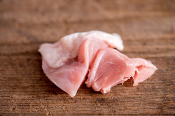 fresh raw meat on old wooden table