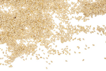 Lot of whole unpeeled sesame seeds flatlay isolated on white background