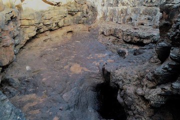 walking between ravines and old house