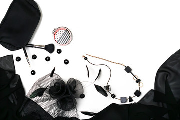Halloween party female outfit collection accessories black on white background, shoes, cloth with skulls, jewelry, bag.