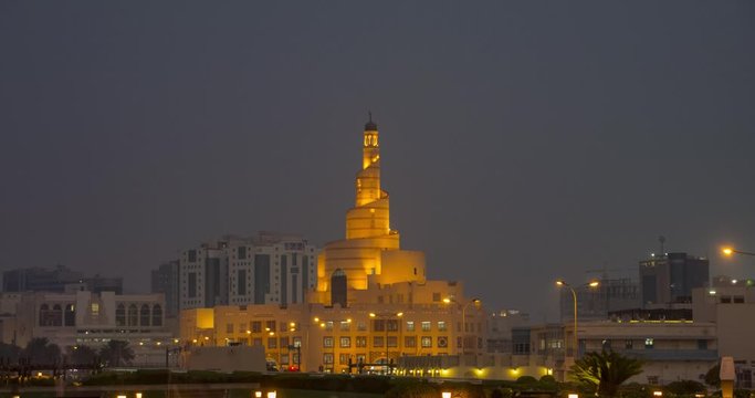 Day to night time lapse of sunset over ancient mosque in Doha, Qatar, Middle East, eye level shot, Football World Cup 2022