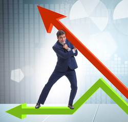 Businessman supporting growtn in economy on chart graph