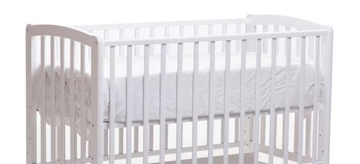 Baby bed cot isolated on the white background