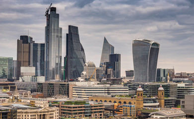 London skyline including skyscrapers, city escape at cloudy day 