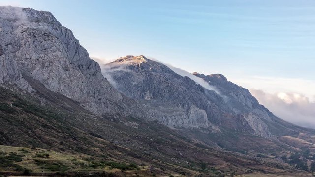 Time lapse with clouds passing through the mountain peaks in the Arbas Valley in Leon, Spain