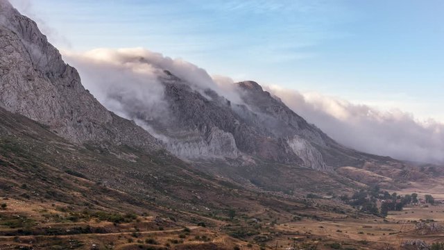 Fantastic time lapse with clouds passing through the mountain peaks in the Arbas Valley in Leon, Spain