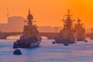 Warships on the Neva. Three ships on the road. Court against the evening city. Armed forces....