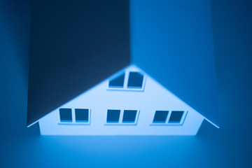 The layout of the house with white walls. Construction and decoration of cottages. Presentation of the construction project. Individual housing construction. Advertising architectural company