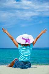 happy girl at sea in greece on sand nature