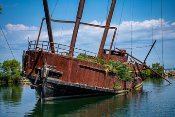 Fototapeta premium abandoned ship decaying in lake 