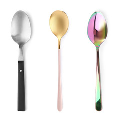 Set of different spoons on white background, top view