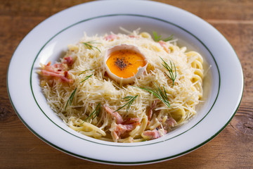 Pasta carbonara. Creamy Spaghetti Carbonara. Italian cuisine dish