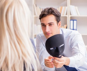 Young man visiting psychiatrist doctor for consultation