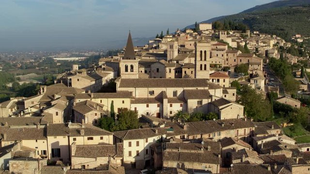 An aerial drone shot of a ancient town in Spello, Italy.