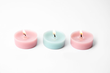 Color wax decorative candles isolated on white