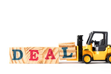 Toy forklift hold letter block l to complete word deal on white background
