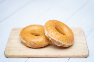 close up sugar coating doughnut