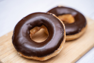close up chocolate coating doughnut