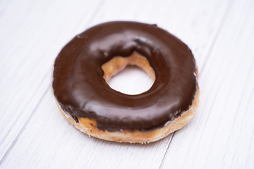 close up chocolate coating doughnut