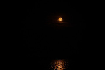 Thunder Moon Full Moon Reflecting Over Lake