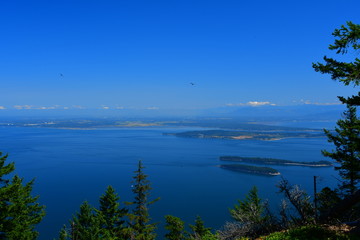 Panoramic view of the San Juan Islands with Mount Baker in the background as seen from Mount Constitution on Orcas Island, Washington