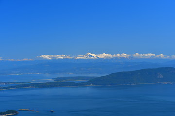 Panoramic view of the San Juan Islands with Mount Baker in the background as seen from Mount Constitution on Orcas Island, Washington