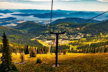 View of Sandpoint and lake Pend Oreille from Schweitzer Mountain  - obrazy, fototapety, plakaty