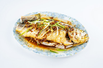 Chinese national dish steamed flower yellow croaker on white background