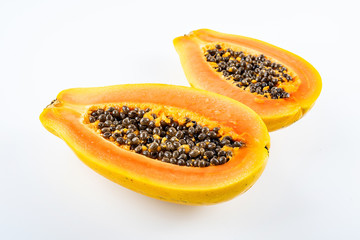 Papaya cut from a fresh fruit on a white background