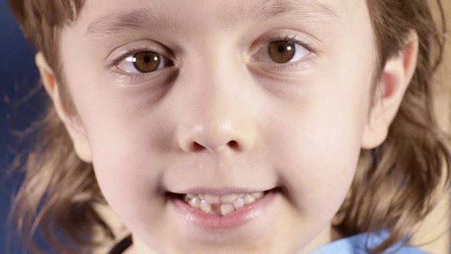 Smiling boy of six years old. Closeup